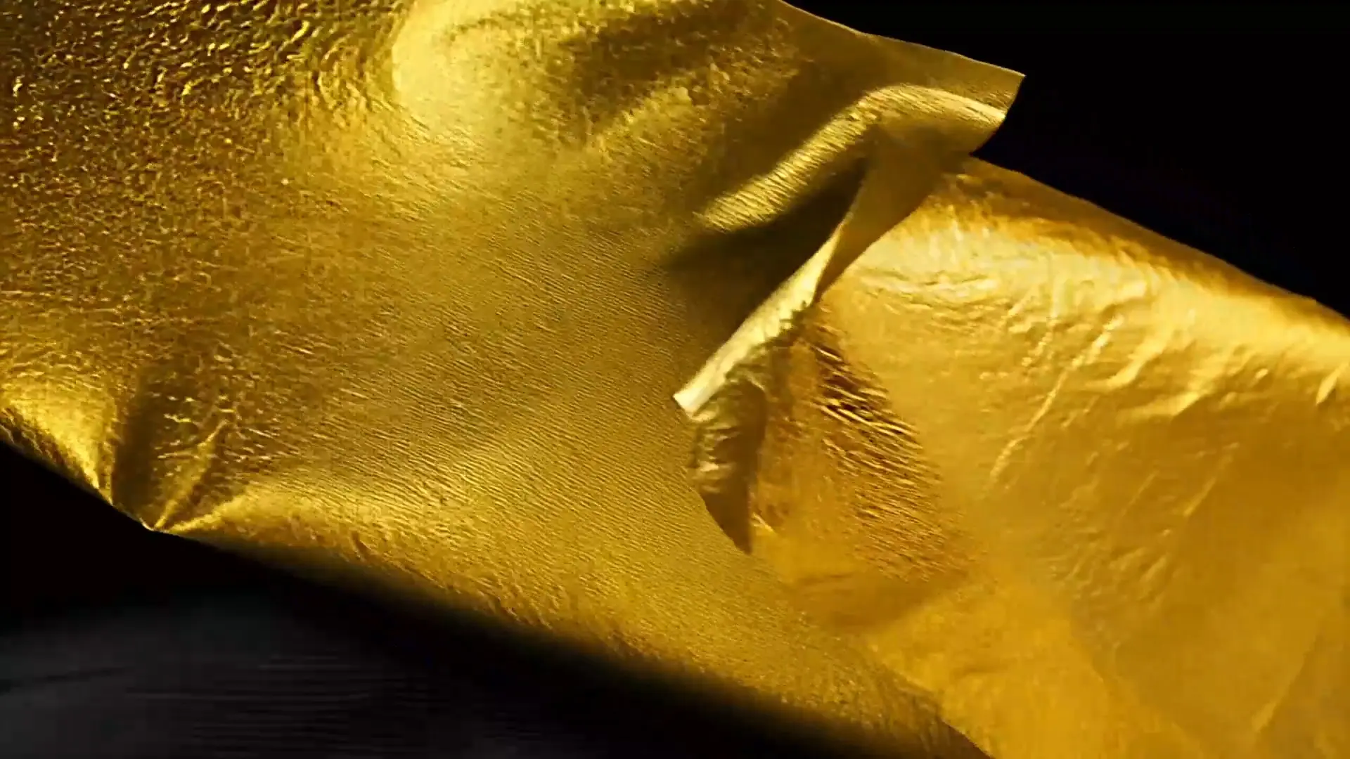 Metallic Gold Foil Stock Video for Background and Animation Projects